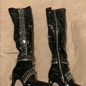 Black thigh high safety pin boots